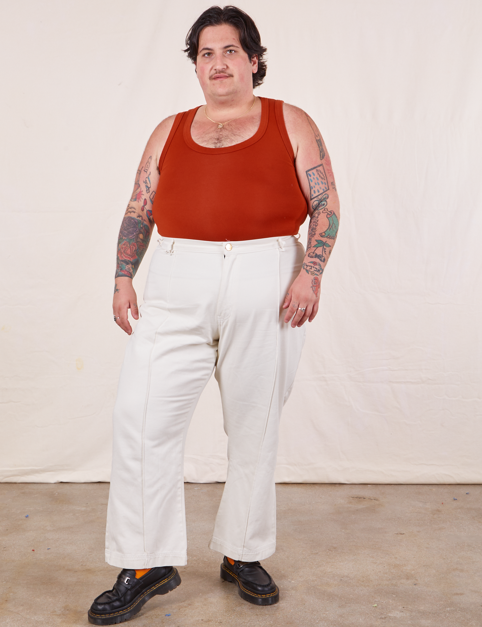 Tank Top in Paprika on Sam wearing vintage off-white Western Pants