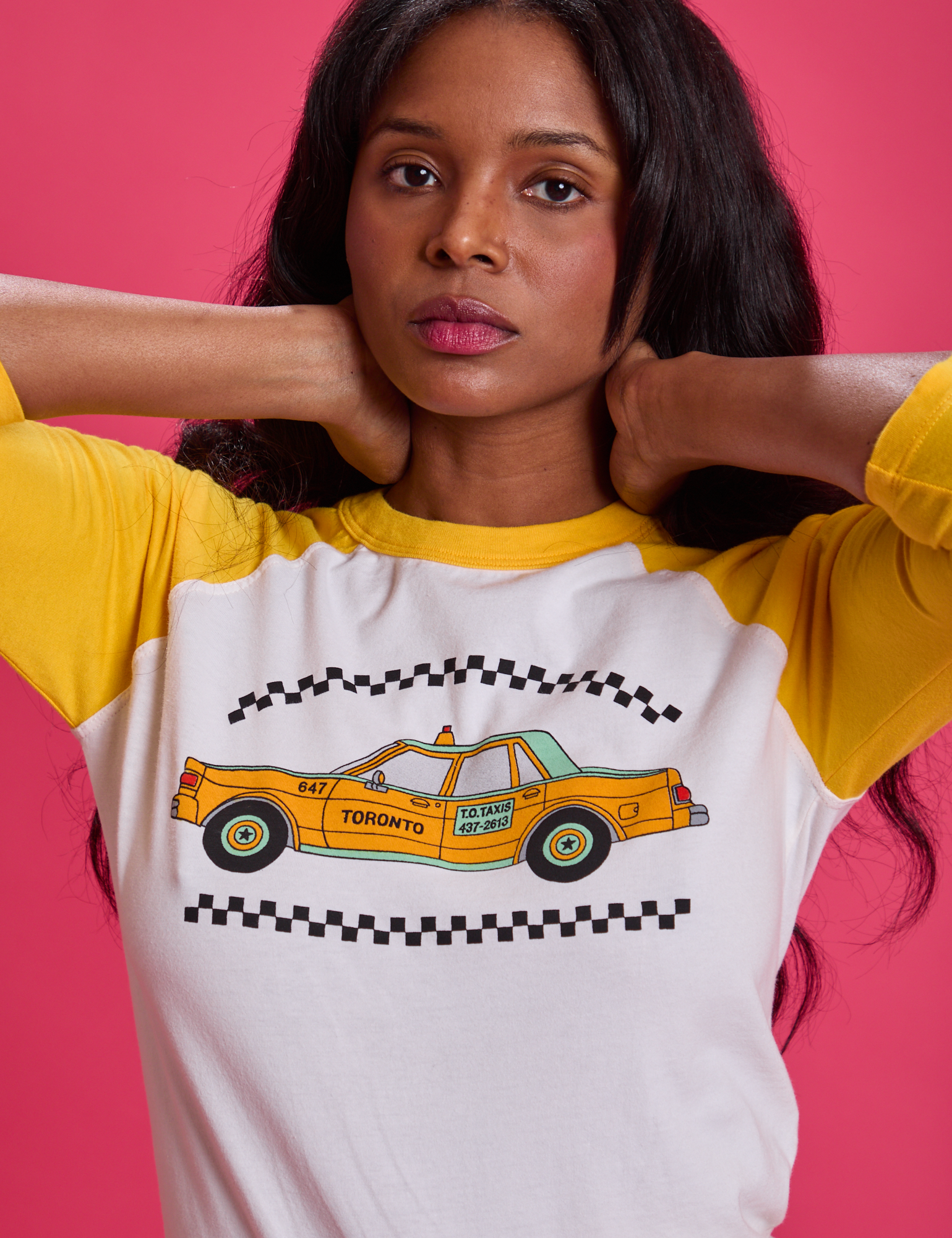 Taxi Raglan Tee in Toronto front close up on Kandia