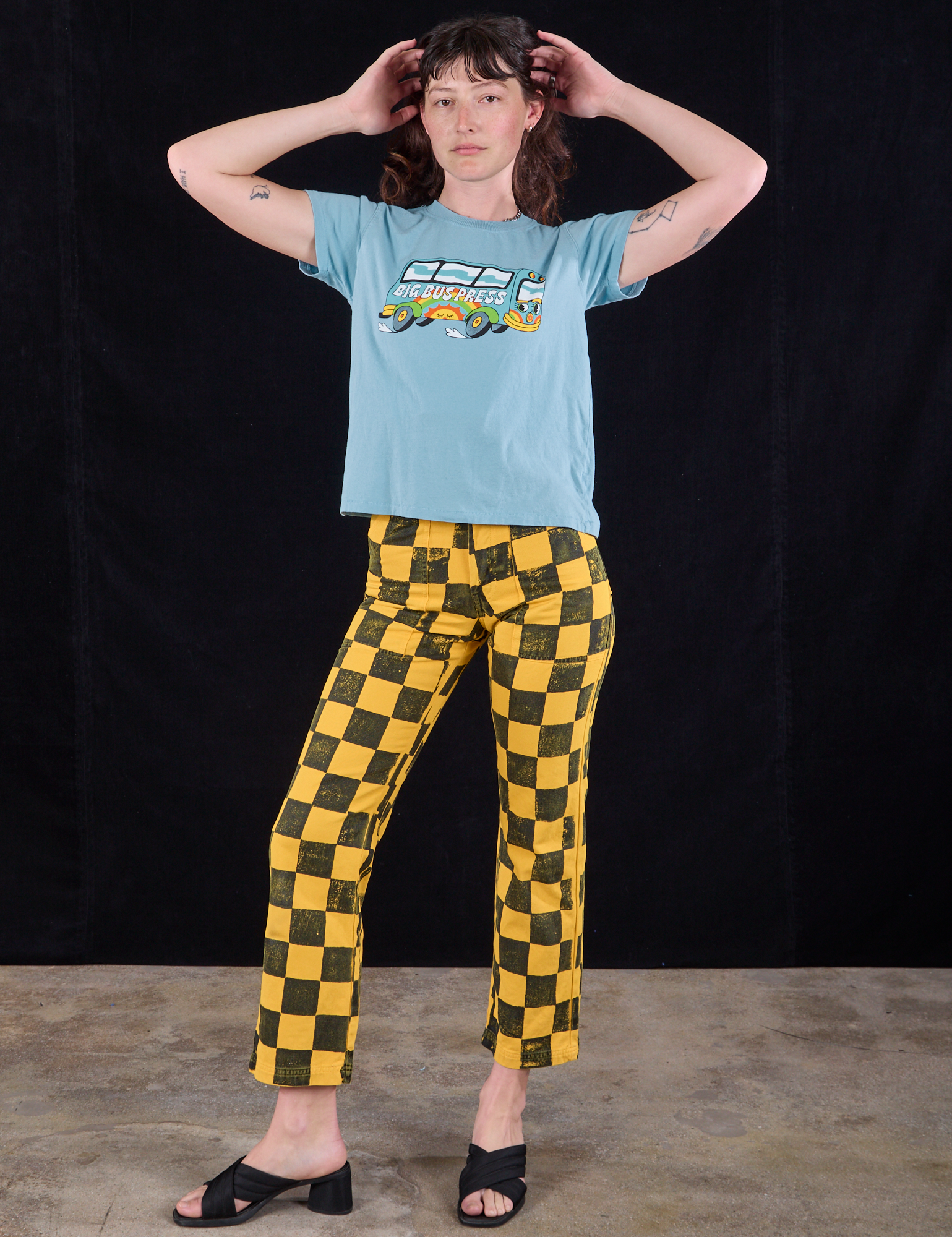 Alex is 5’8” and wearing P Bus Stop Organic Tee paired with Checkboard Taxi Work Pants