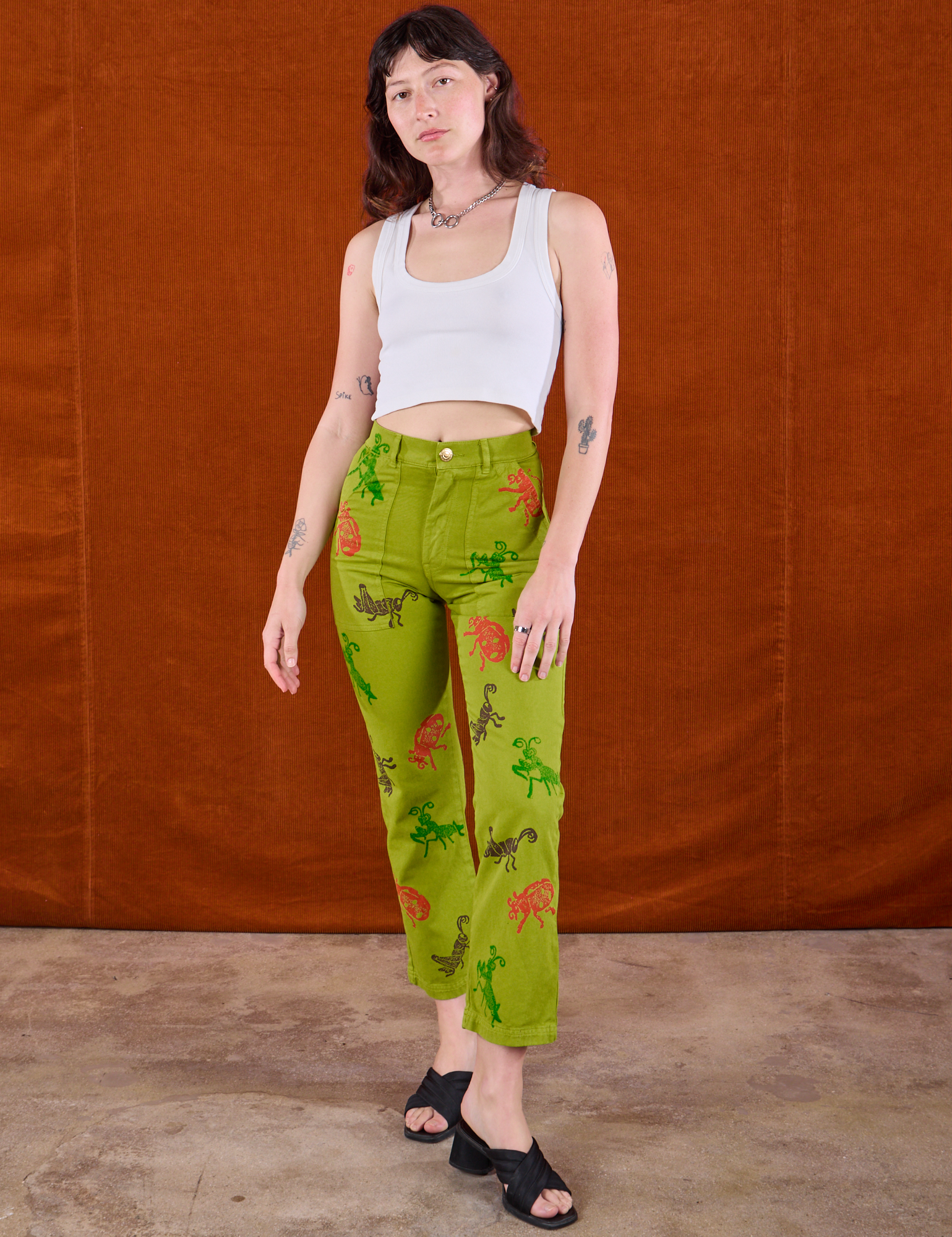 Paintstamped Bug Work Pants in Gross Green and Cropped Tank in Vintage Tee Off-White on Alex