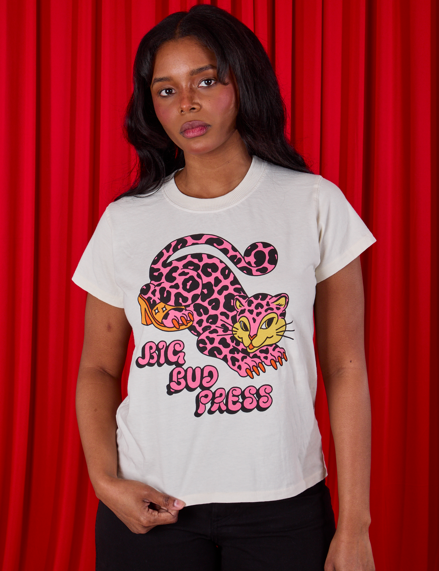 Kandia is 5'3" and wearing XXS Cheetah Organic Tee