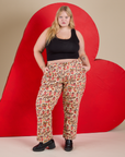 Juliet is wearing Work Pants in Hot Stuff Print and black Cropped Tank