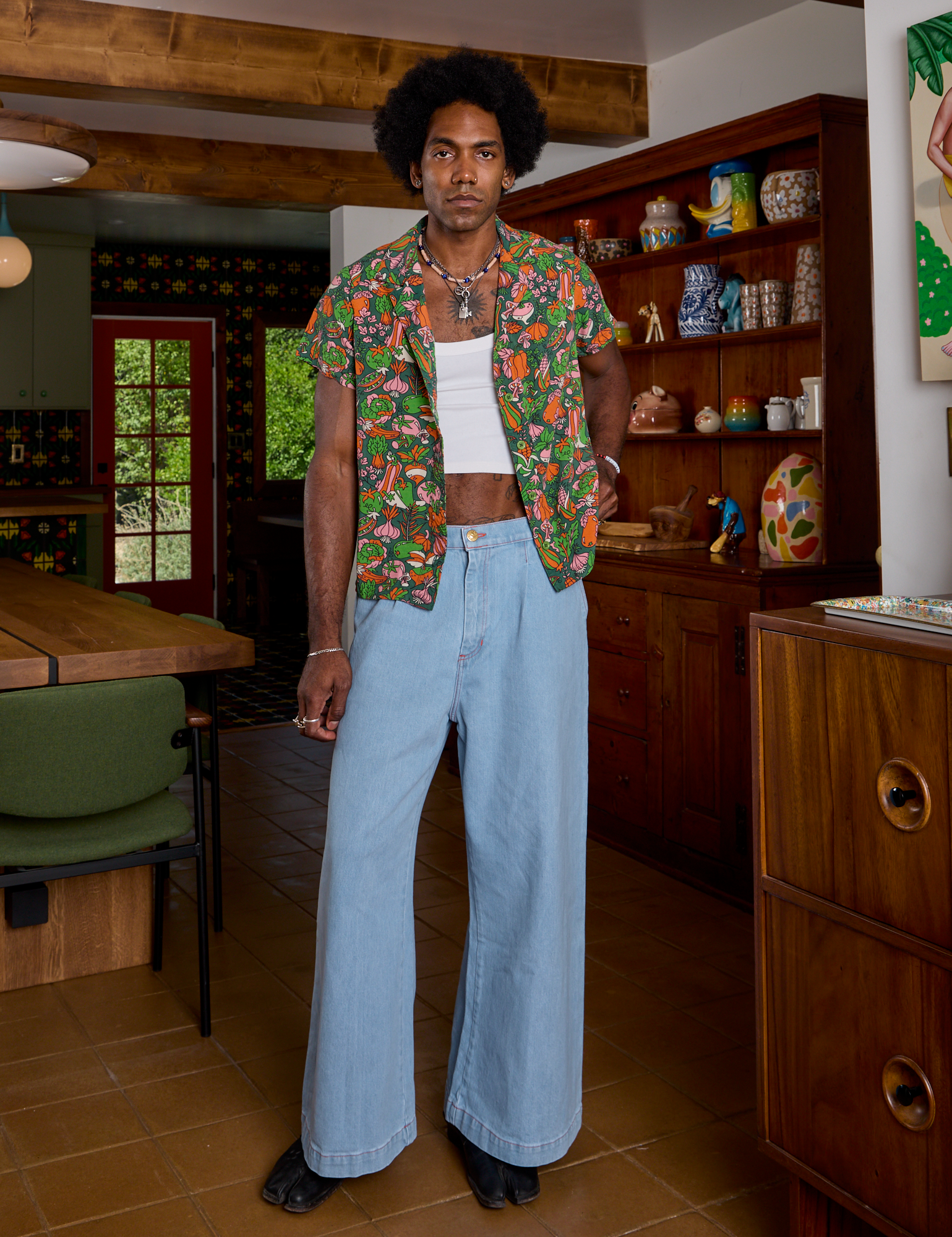 Jerrod is wearing Kitchen Collection Pantry Button-Up and light wash Indigo Wide Leg Trousers