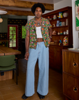 Jerrod is wearing Kitchen Collection Pantry Button-Up and light wash Indigo Wide Leg Trousers