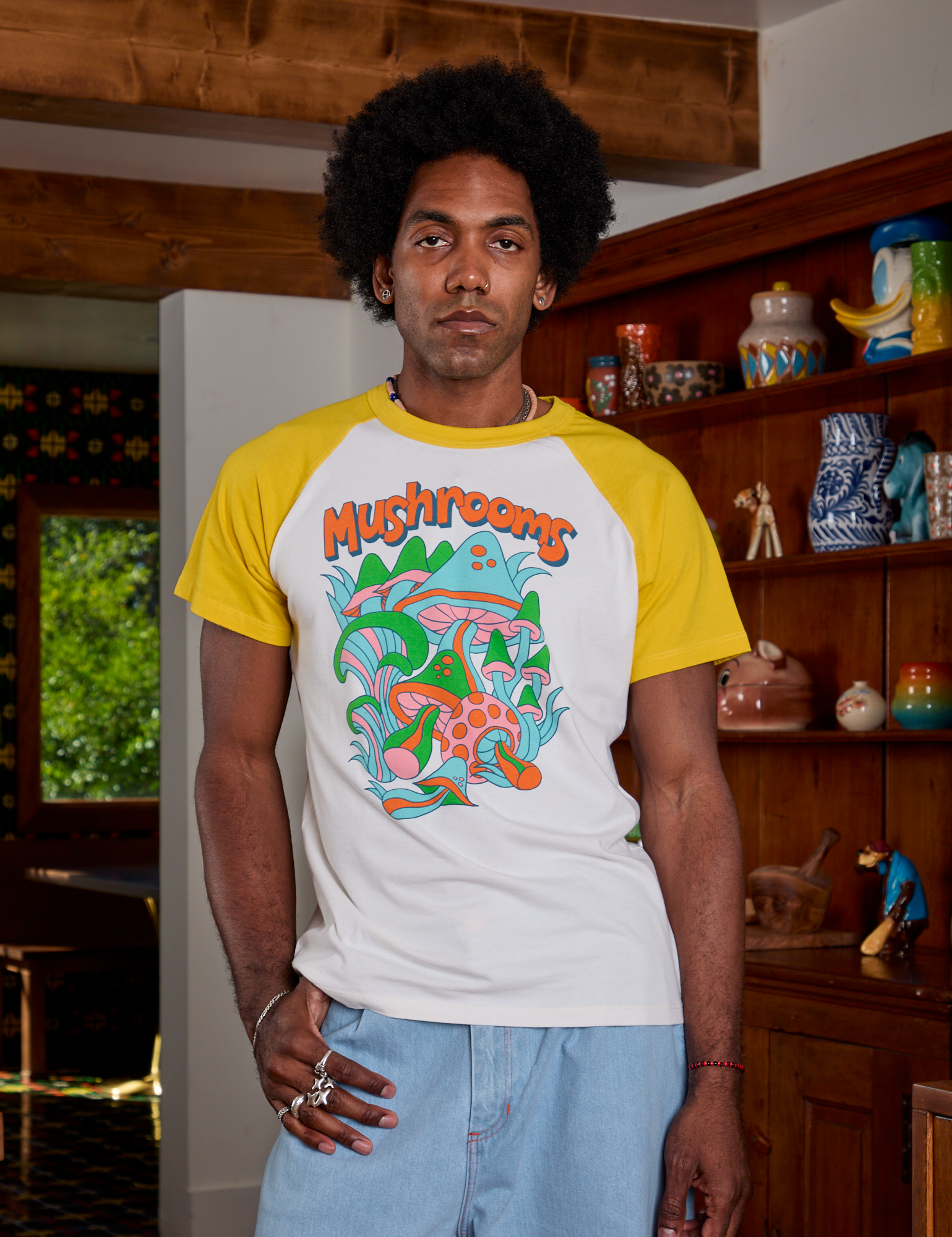 Jerrod is 6'3" and wearing M Short Sleeve Raglan Tee in Mushrooms