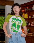 Alex is 5'8" and wearing P Short Sleeve Raglan Tee in Snap Peas
