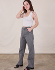 Angled front view of Work Pants in Washed Grey and Cropped Tank in Vintage Tee Off-White on Hana