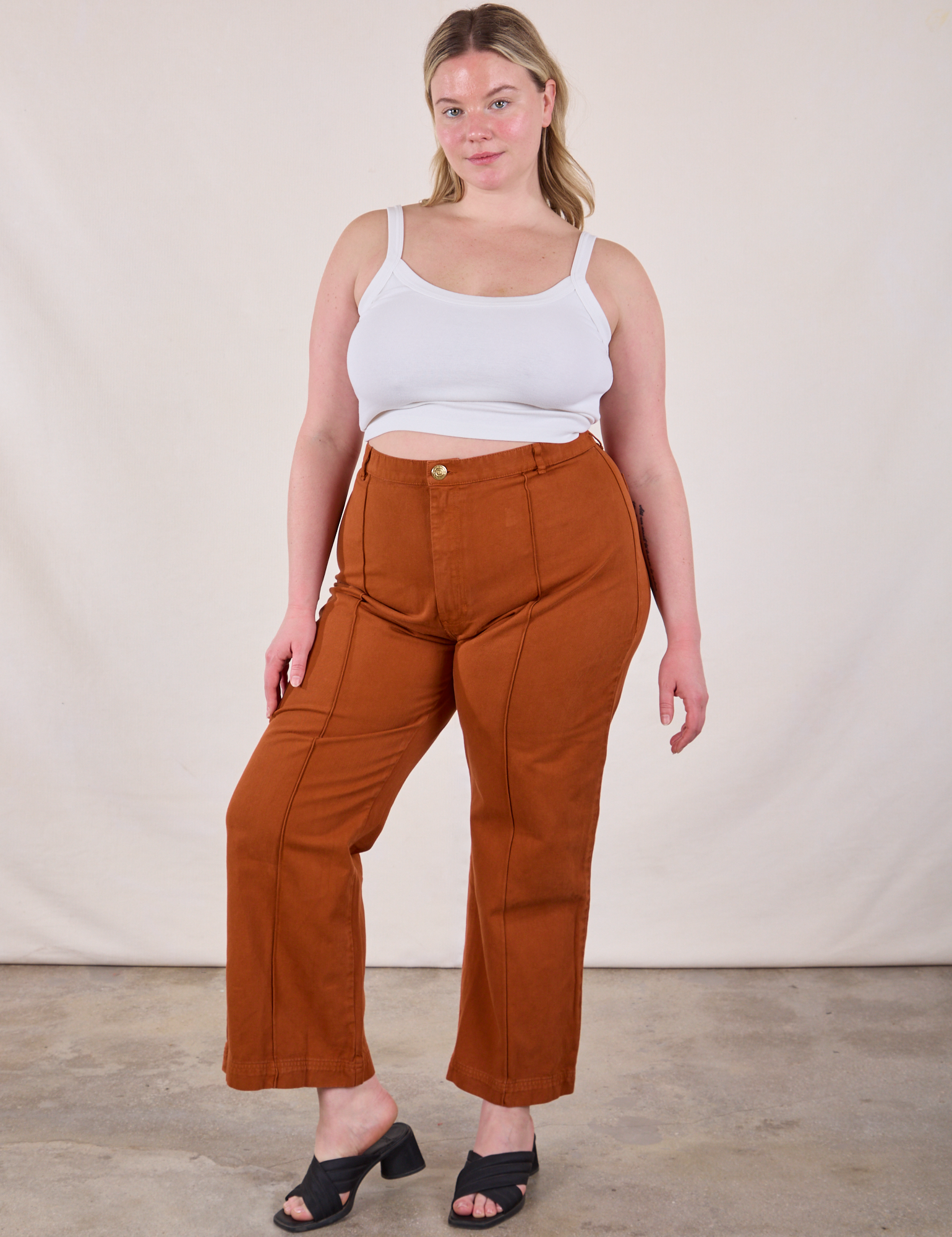 Lish is wearing Western Pants in Burnt Terracotta and Cropped Cami in Vintage Tee Off-White