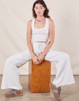 Alex is wearing Wide Leg Sweat Pants in Vintage Tee Off-White and Cropped Tank