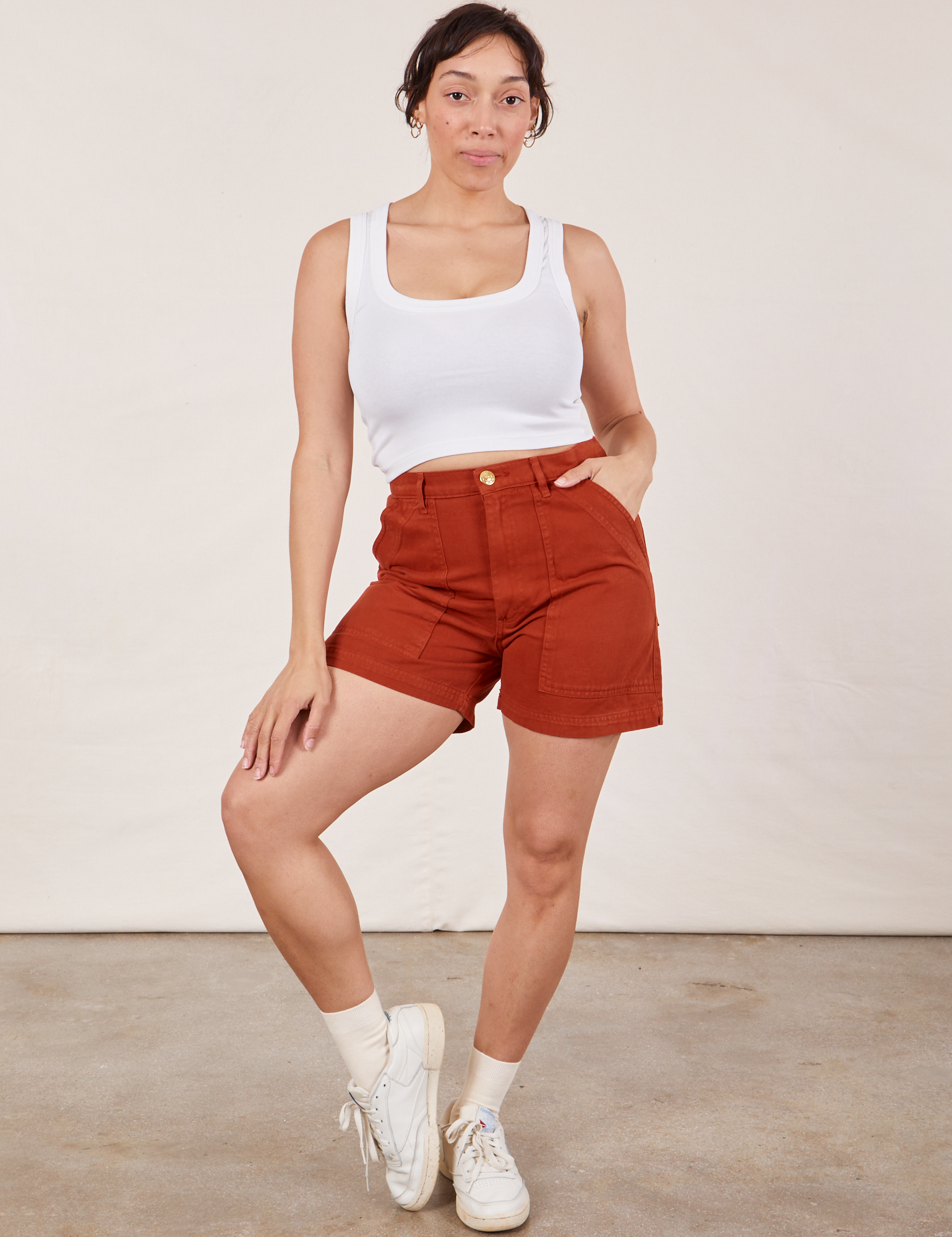 Tiara is wearing Classic Work Shorts in Paprika and Cropped Tank Top in vintage tee off-white