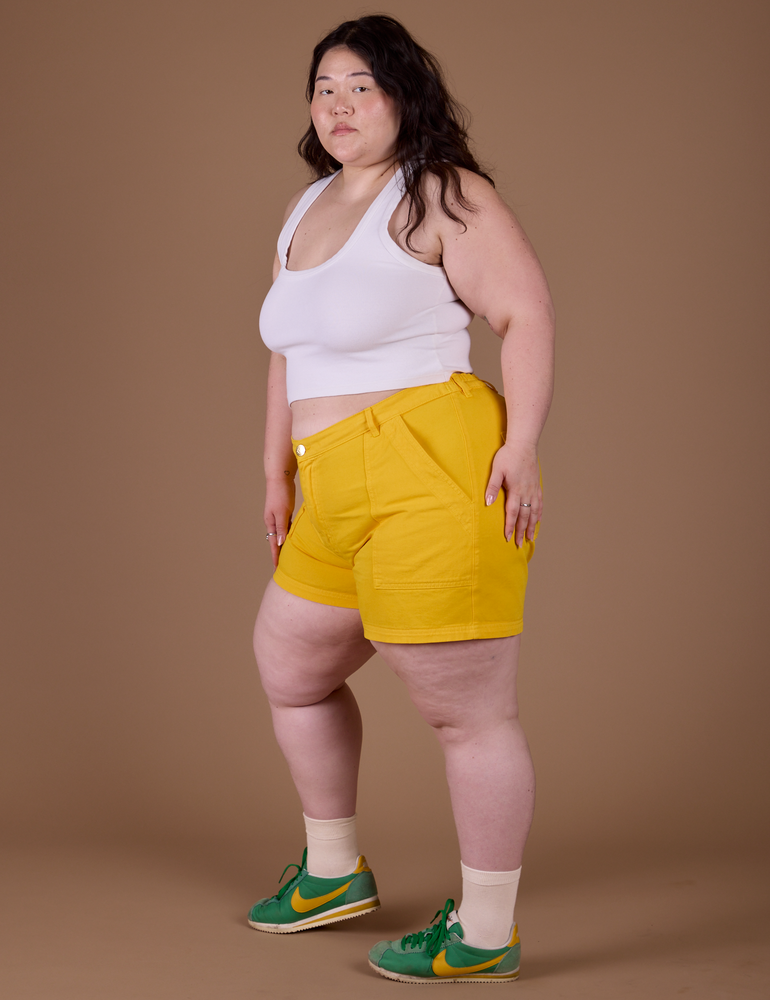 Side view of Classic Work Shorts in Sunshine Yellow and Cropped Tank in Vintage Tee White on Ashley
