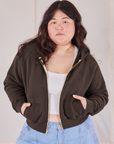 Ashley is 5'7" and wearing L Cropped Zip Hoodie in Espresso Brown with a vintage off-white Cropped Tank underneath