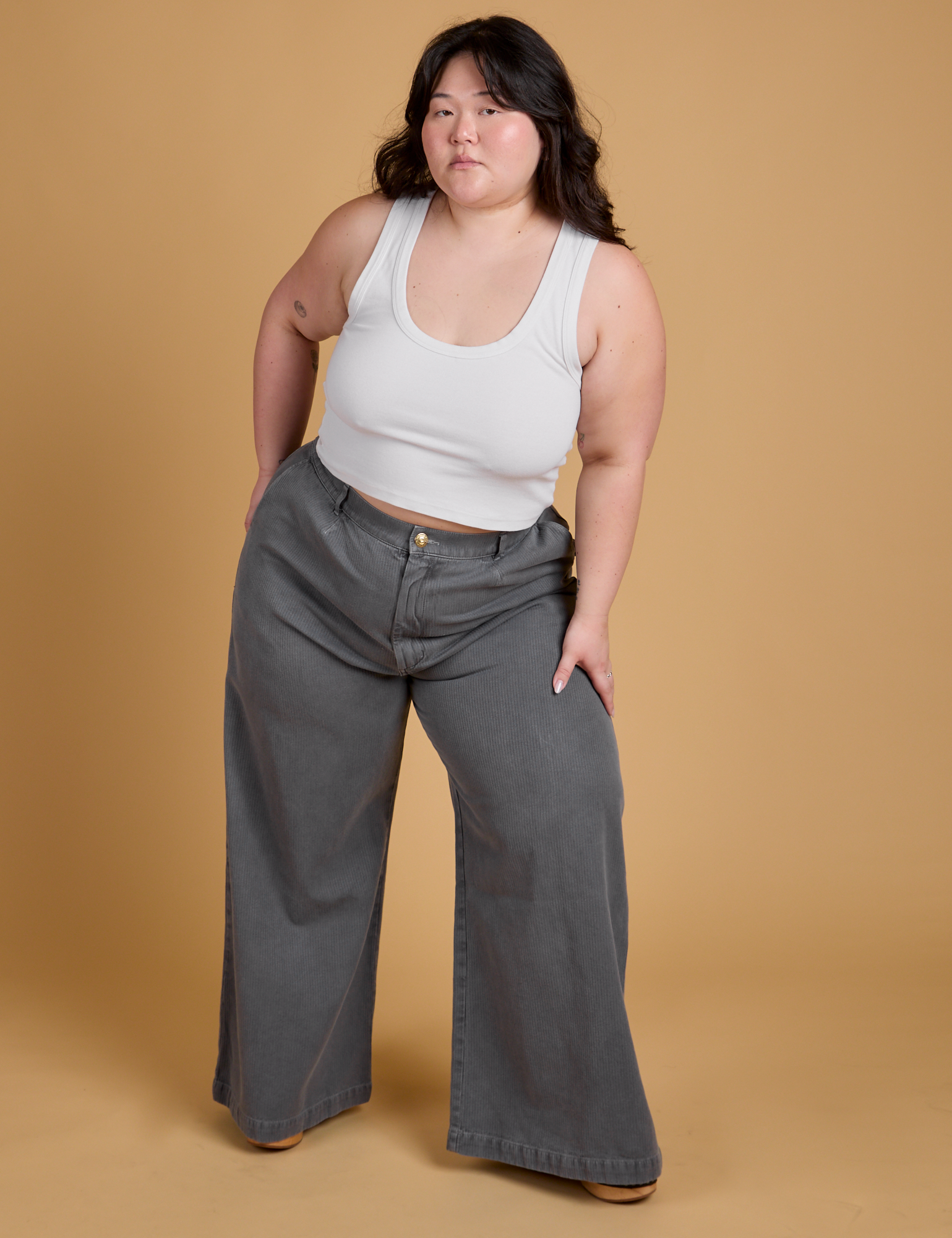 Heritage Wide Leg Trousers in Washed Grey and vintage tee white Cropped Tank on Ashley