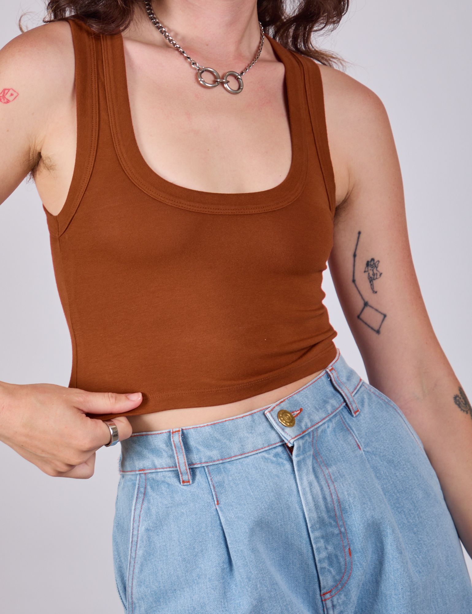 Cropped Tank Top in Burnt Terracotta close up on Alex