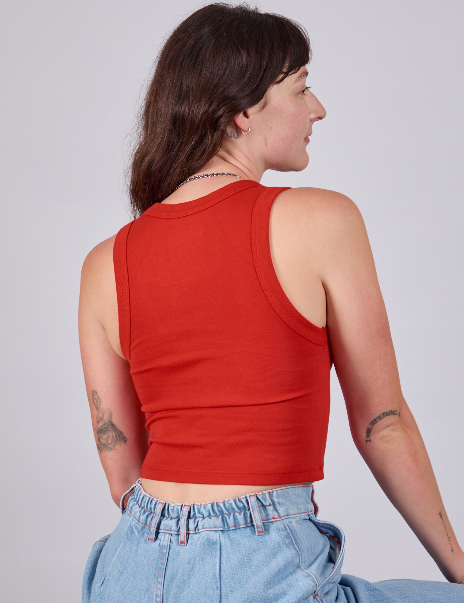 Cropped Tank Top in Mustang Red back view on Alex
