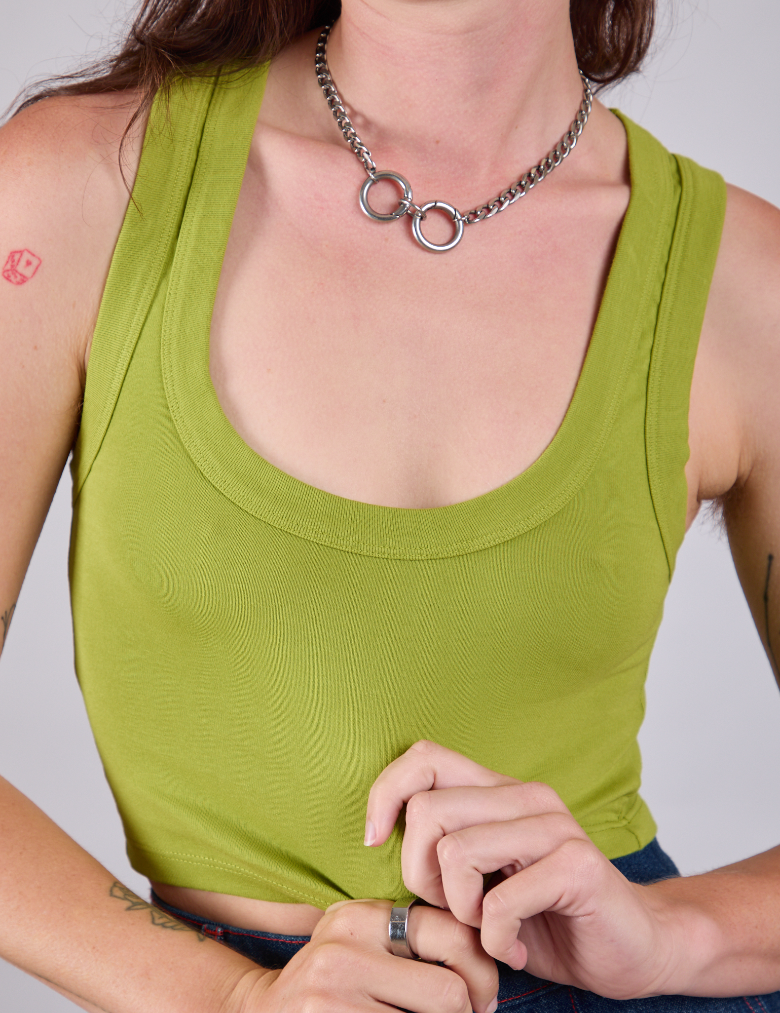 Front close up of Cropped Tank Top in Gross Green on Alex