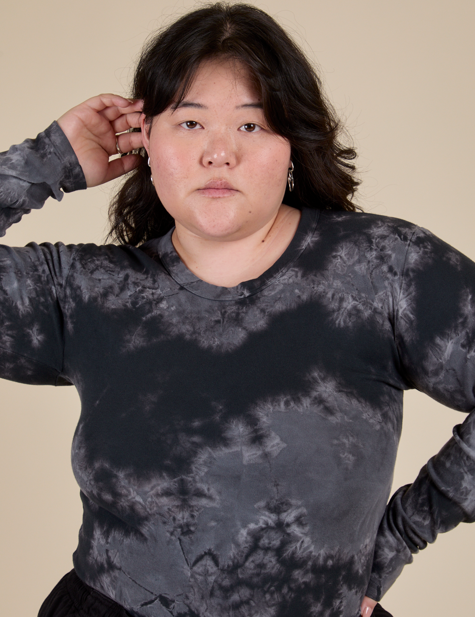 Long Sleeve Baby Tee in Black Magic Waters front close up on Ashley