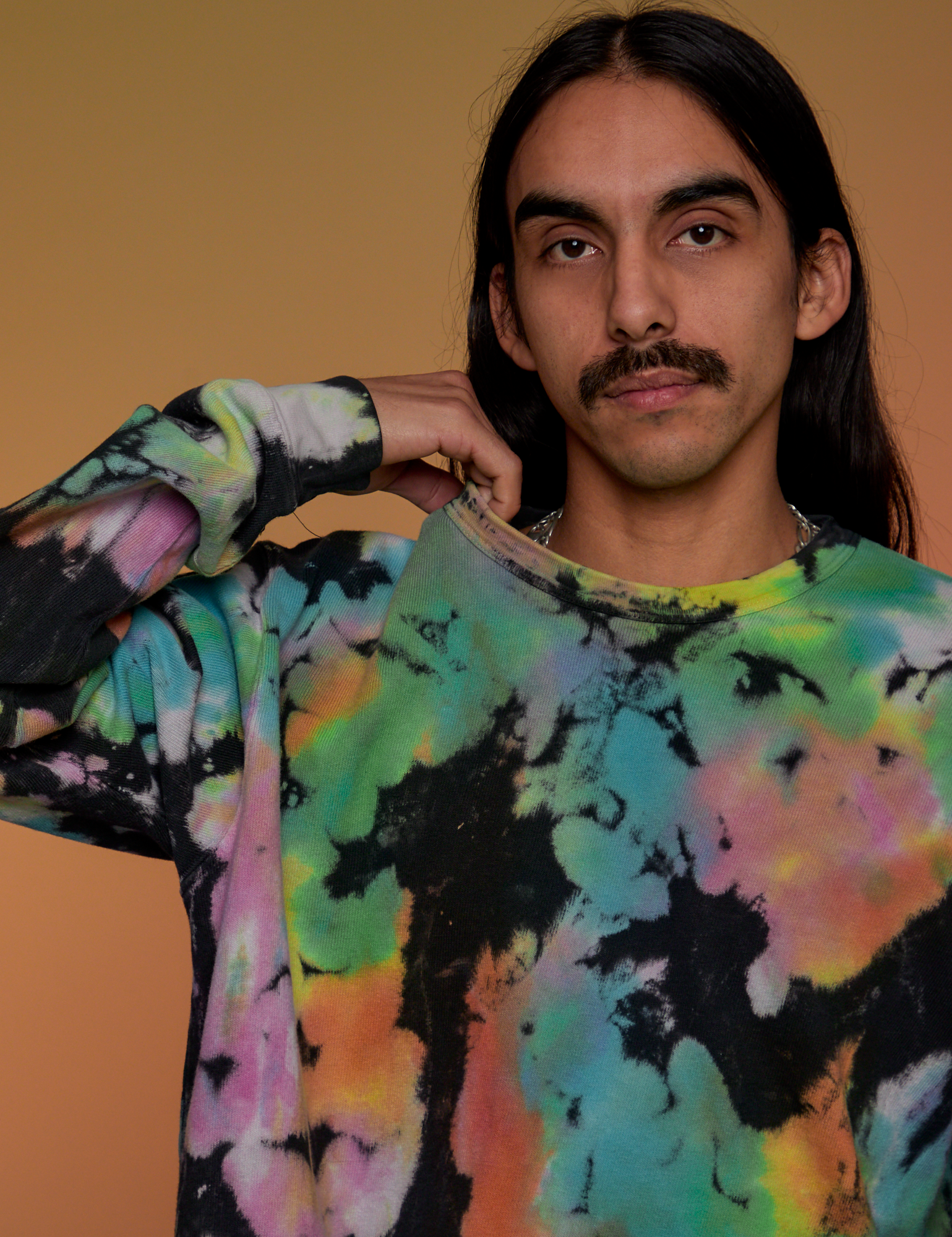Magic Waters Long Sleeve Burly Tee in Rainbow front close up on Anthony