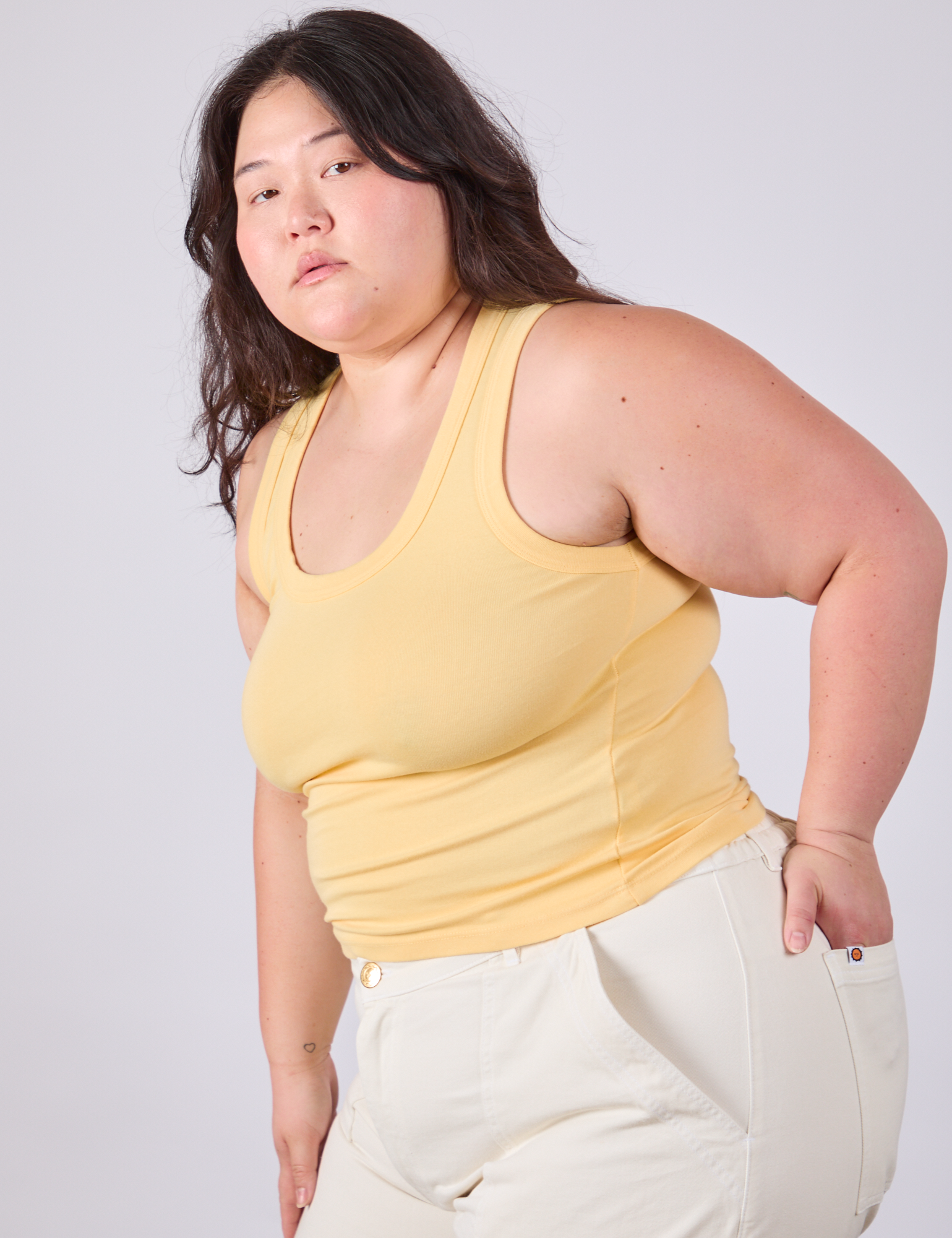 Tank Top in Butter Yellow angled front view on Ashley