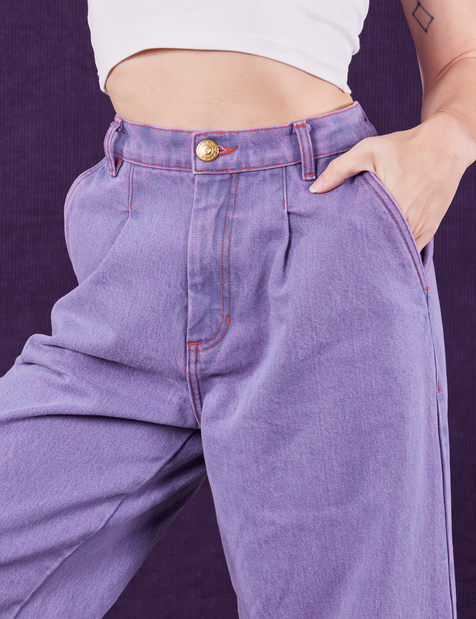 Overdyed Wide Leg Trousers in Faded Grape front close up on Alex