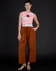 Alex wearing the Black Star Airbrush Muscle Tee with Burnt Terracotta Drop Pocket Cargo Pants