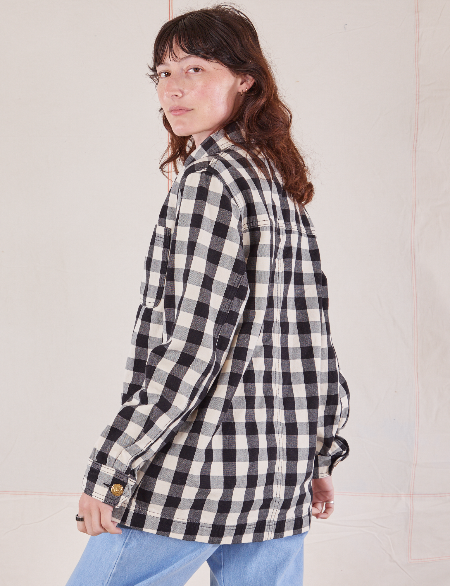 Angled back view of Big Gingham Field Coat on Alex