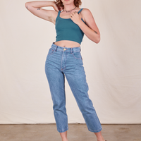 Alex is wearing Cropped Cami in Marine Blue and light wash Frontier Jeans