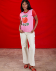 Kandia is wearing Vintage Tee in Big Red Cherry paired with vintage tee off-white Western Pants