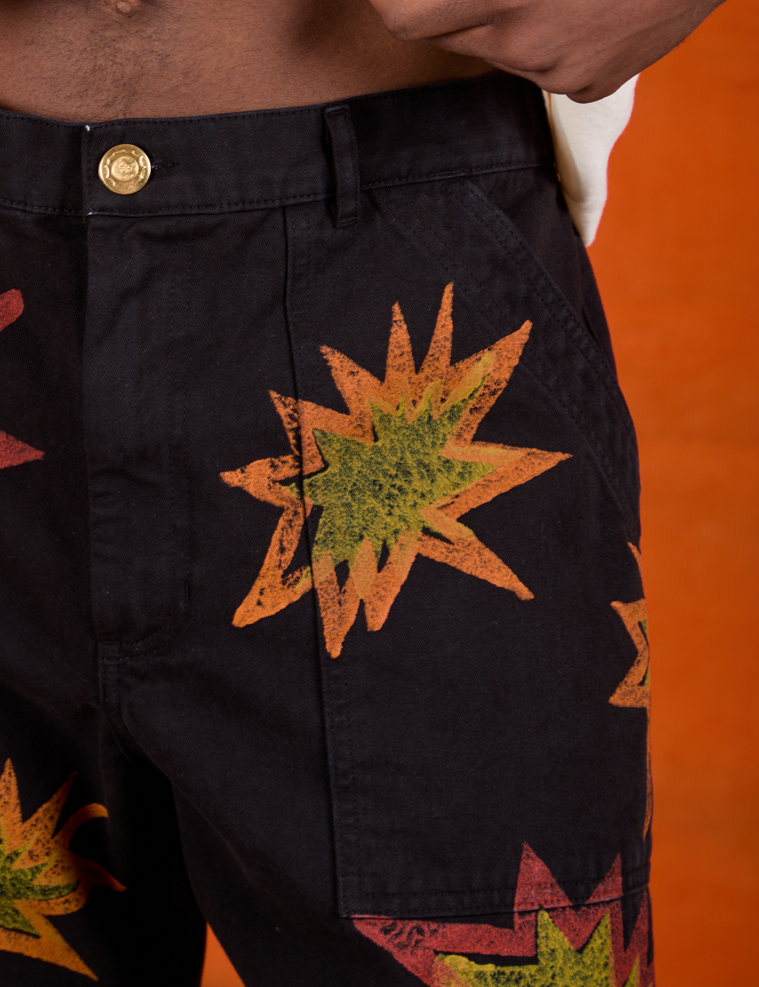 Paintstamped Work Pants in Explosion close up on Isaac