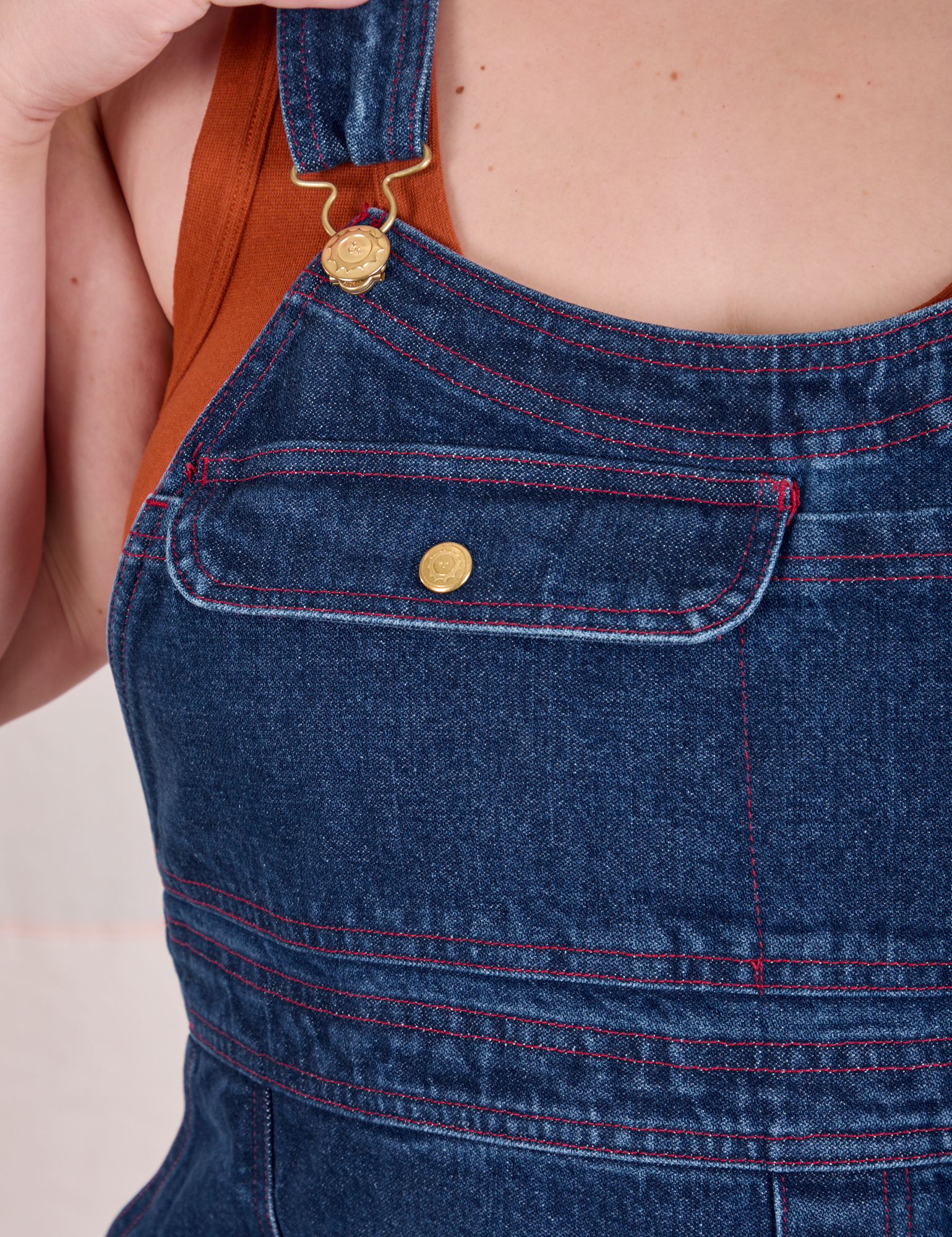 Carpenter Overalls in Dark Wash front close up on Ashley