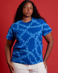 Meghna is 5'8" and wearing M Chain Link Vintage Tee in Royal Blue
