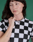 Front close up of Checker Organic Tee in Black on Alex