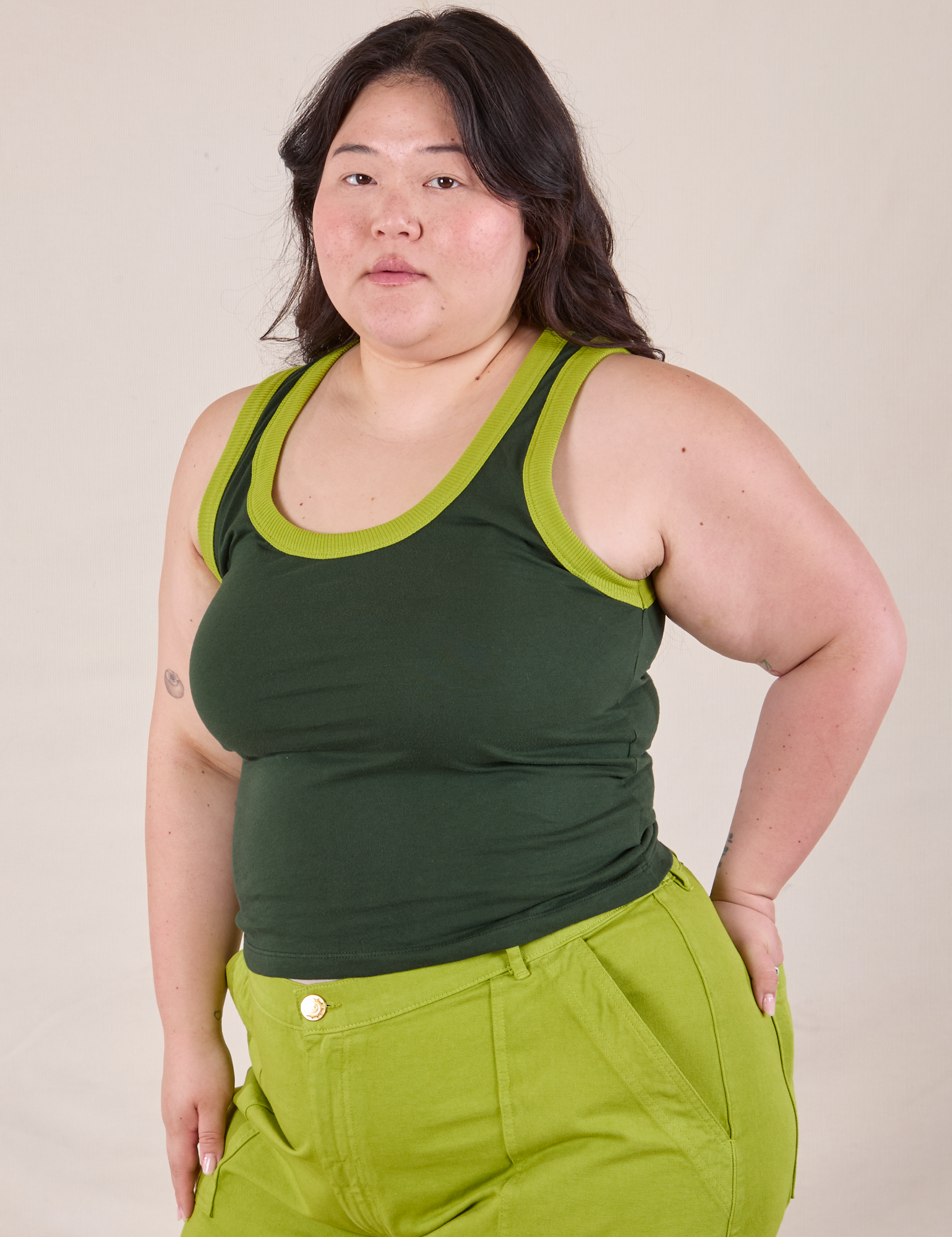 Colorblock Cropped Tank in Swamp Green angled front view on Ashley