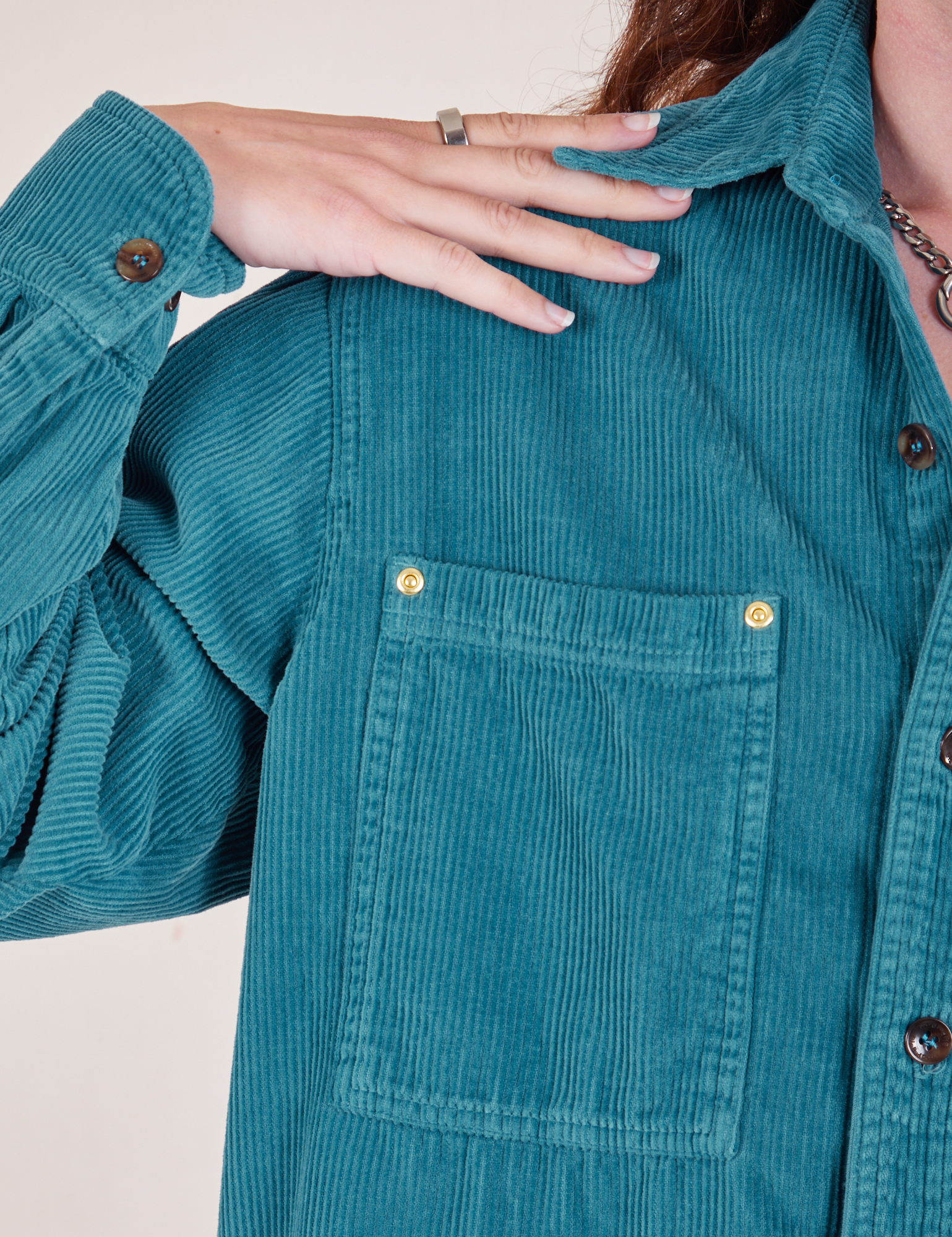 Front pocket close up of Corduroy Overshirt in Marine Blue on Alex