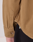 Cropped Overshirt in Desert Brown bottom hem close up on Quinn