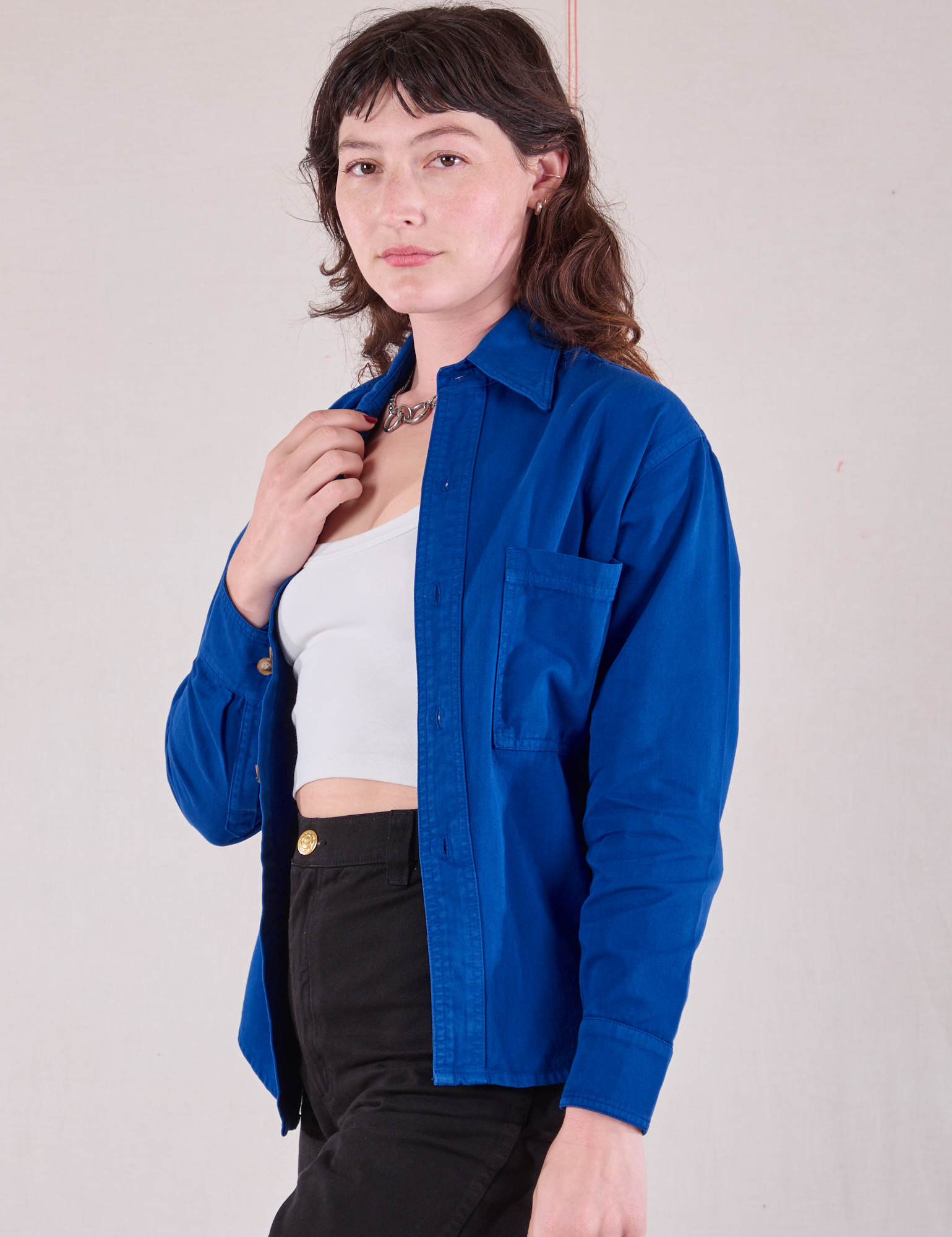 Cropped Overshirt in Royal Blue angled front view on Alex