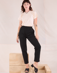 Alex is wearing Easy Pants in Basic Black and Organic Vintage Tee in vintage tee off-white