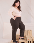 Side view of Easy Pants in Espresso Brown and vintage tee off-white Wrap Top