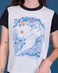 Vintage Tee in California Girl front close up. White tee body with black sleeves and neckline.