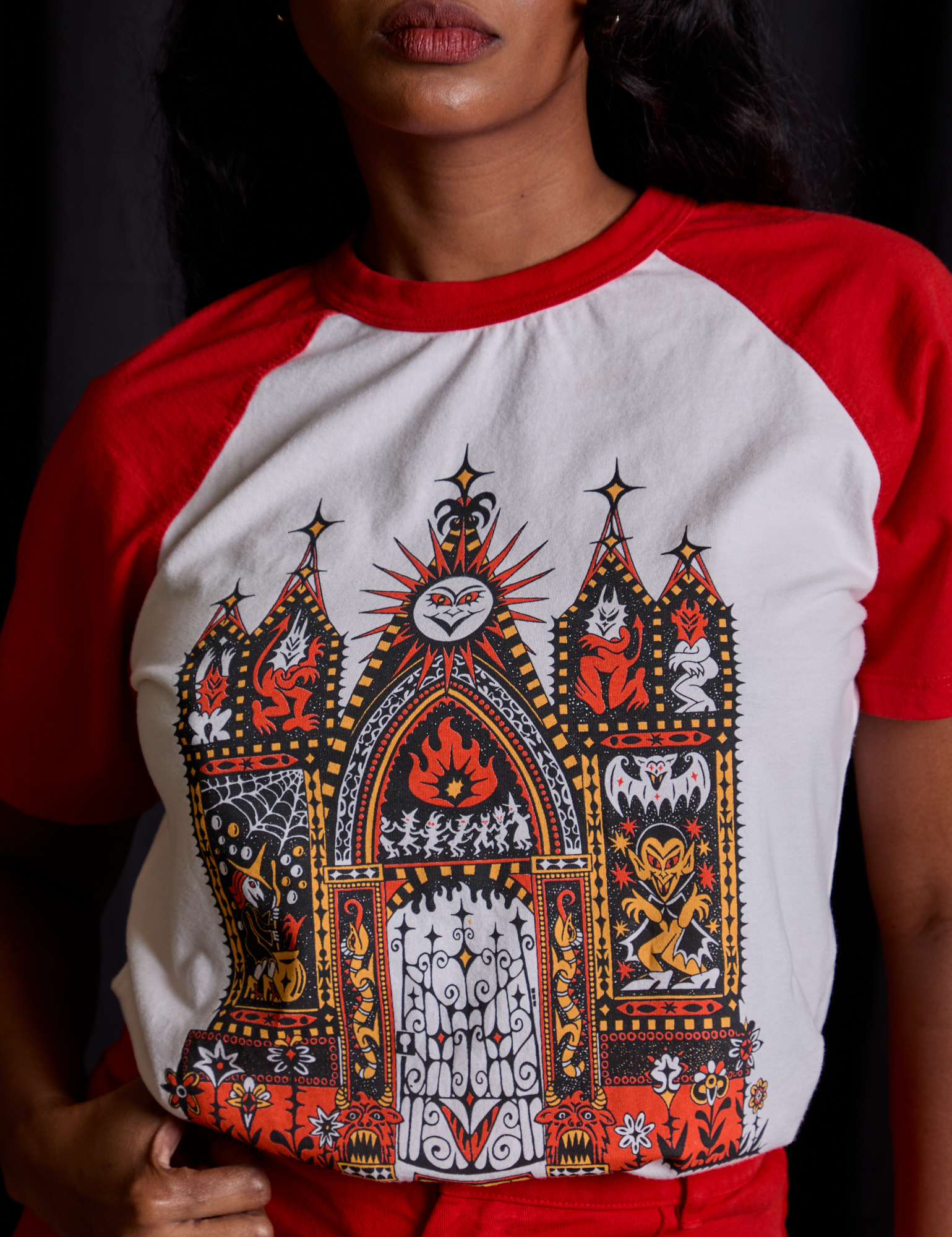 Short Sleeve Raglan Tee in Gates of Hell front close up on Kandia