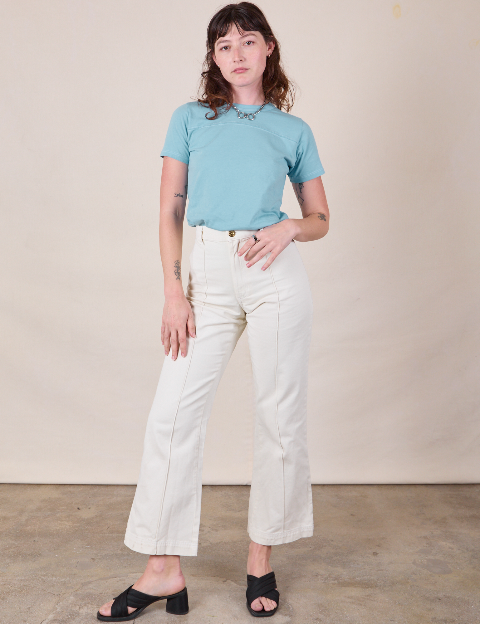 JV Tee in Baby Blue and vintage tee off-white Western Pants on Alex