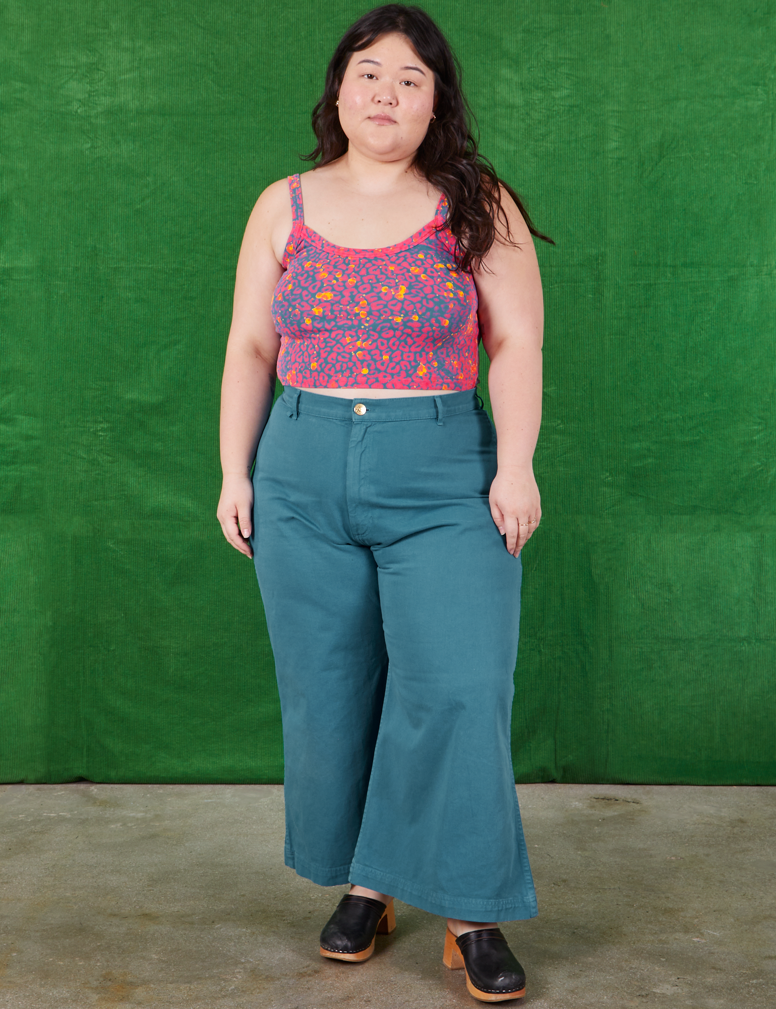 Ashley is wearing Cami in Electric Leopard and marine blue Bell Bottoms
