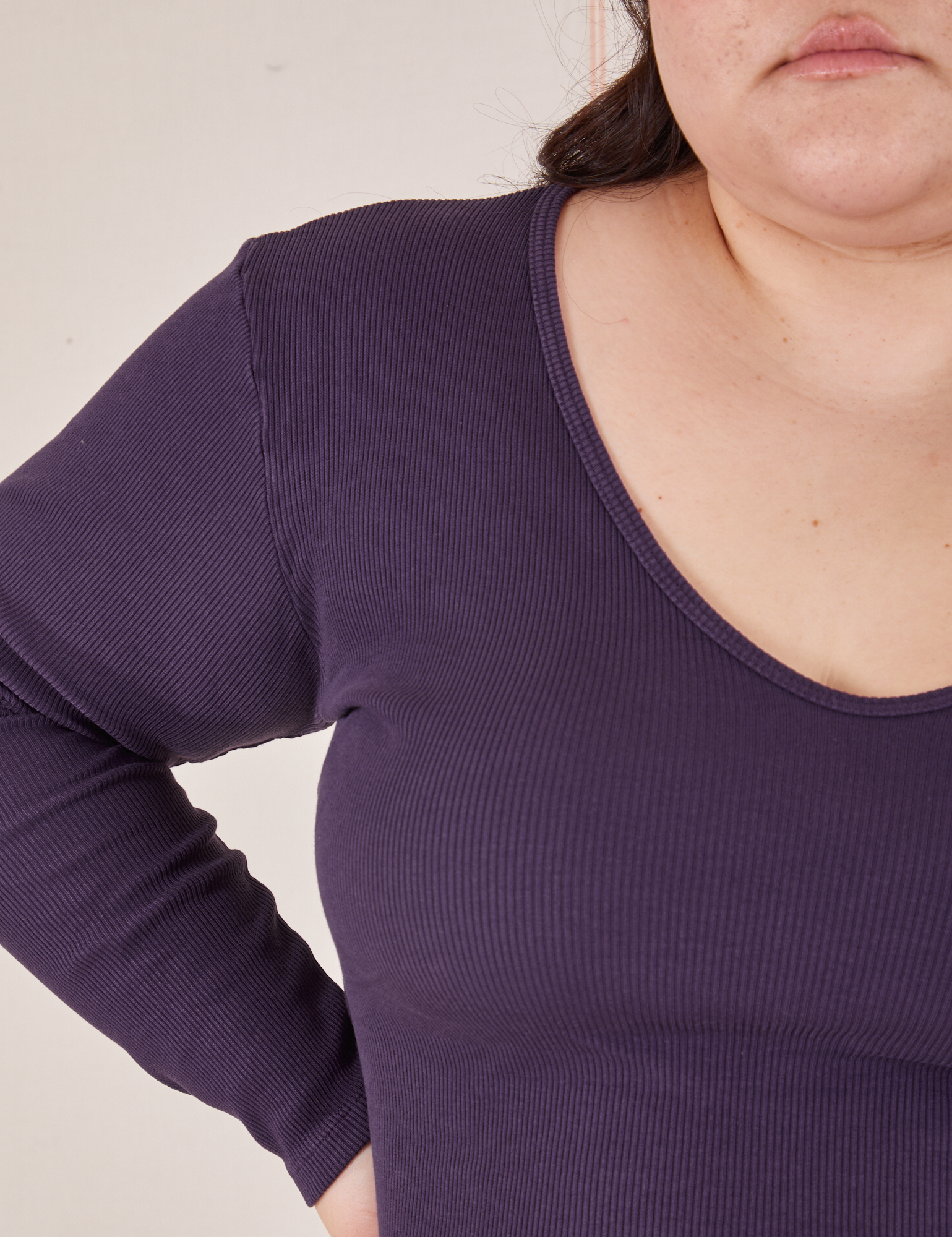 Front close up of Long Sleeve V-Neck Tee in Nebula Purple worn by Ashley