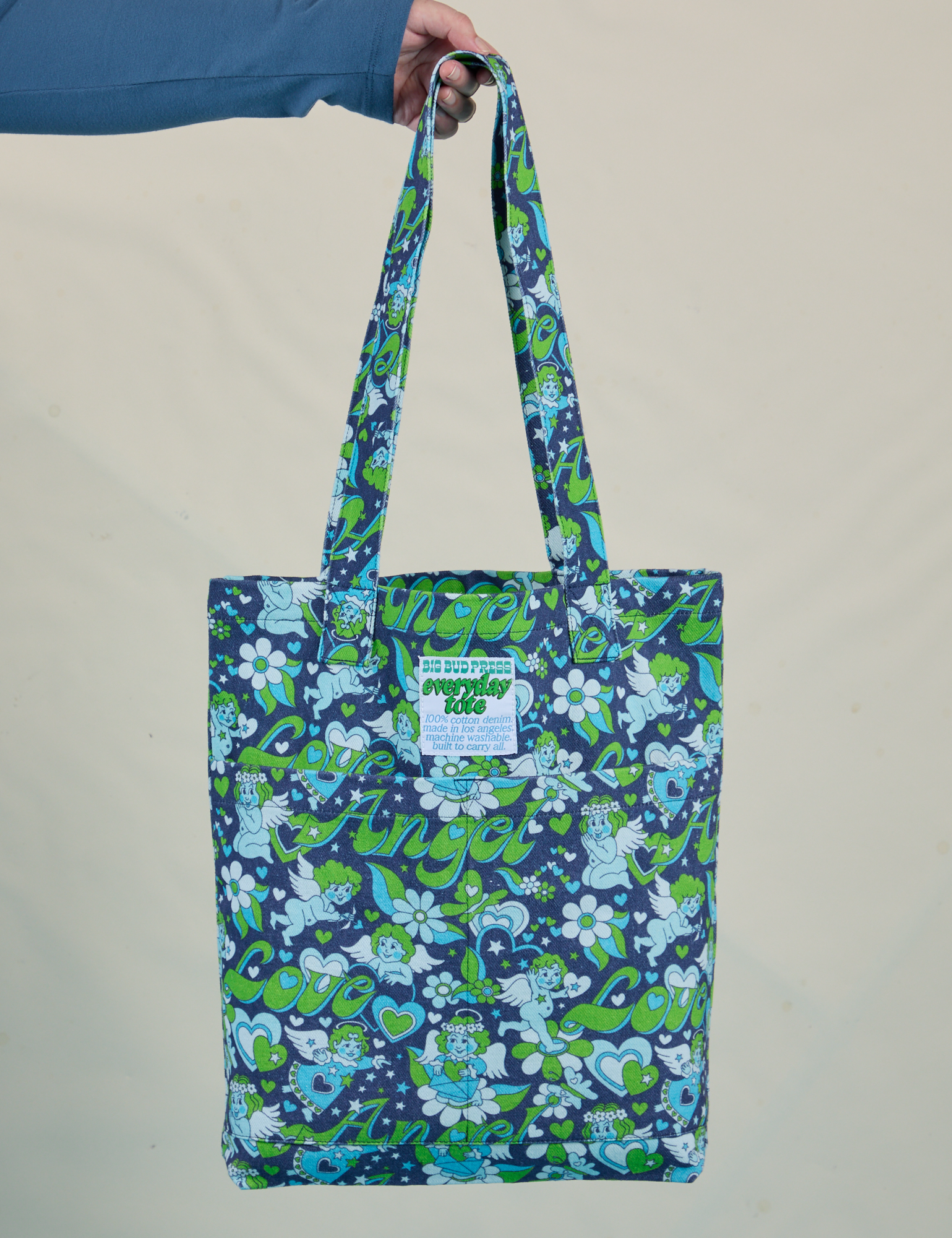 Angel Printed Everyday Tote held by model
