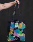 Everyday Tote in Rainbow Magic Waters held by model