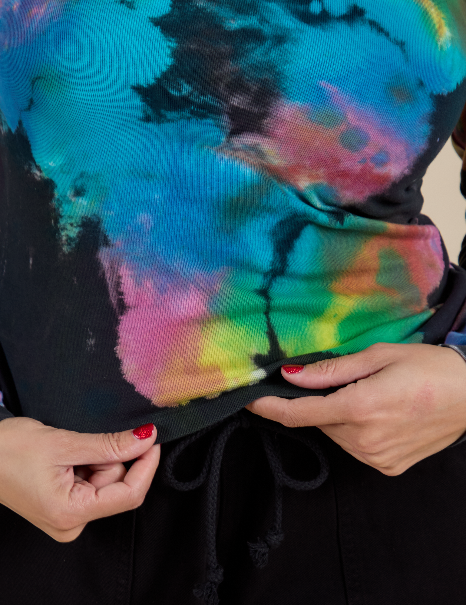 Long Sleeve Baby Tee in Rainbow Magic Waters bottom hem close up on Tiara