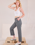 Side view of Mid-Rise Work Pants in Slate Grey and Cropped Tank in vintage tee off-white on Margaret