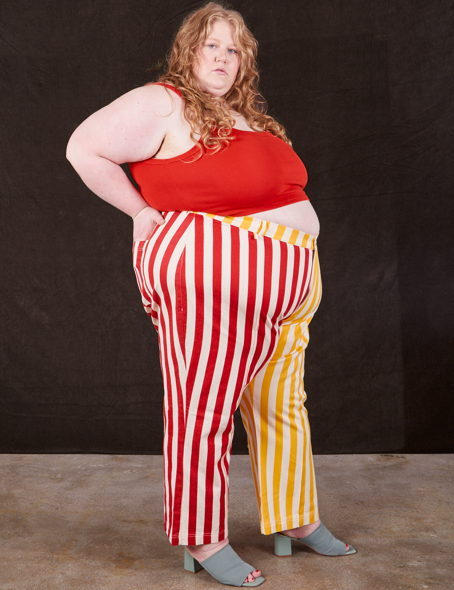 Side view of Western Pants in Ketchup/Mustard Stripes and mustang red Cami