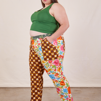 Side view of Mismatched Print Work Pants and lawn green Cropped Tank worn by Marielena