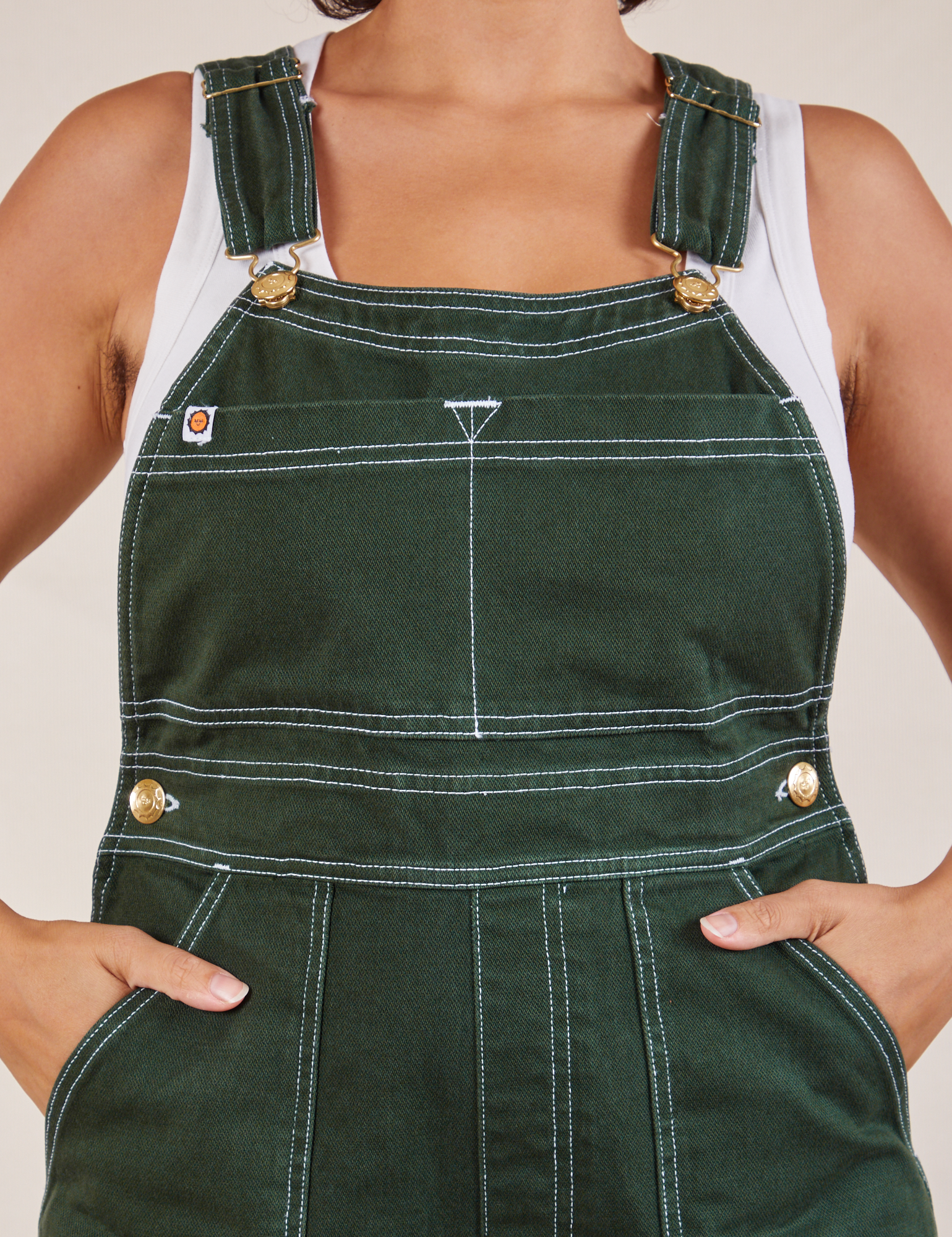 Original Overalls in Swamp Green front close up on Tiara